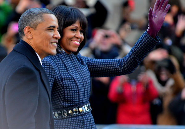 כנפיים, פיצה, נאצ'וס וגווקאמולי - יש, אינטרנט - לא כל כך. מישל וברק אובמה. צילום: BigStock