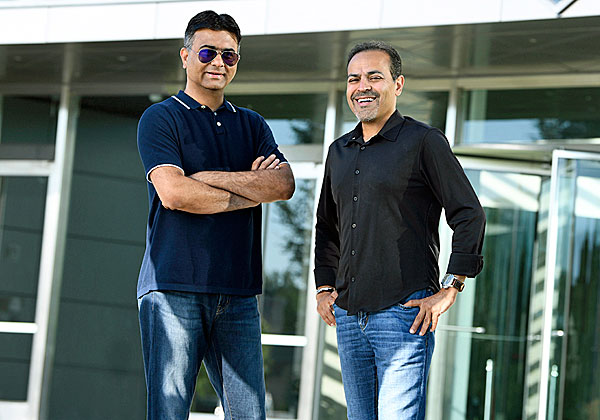 המנכ"לים של שתי החברות: אבינאס לקשמן מהדוויג וסאנג'יי מירצ'נדאני מקומוולט. צילום: יח"צ