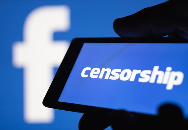 עובדים מלינים על צנזורה נגד פלסטינים בפייסבוק. אילוסטרציה: BigStock