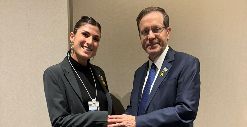 שרון אסא והנשיא יצחק (בוז'י) הרצוג בדאבוס.