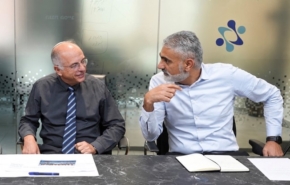 ראש מערך הסייבר הלאומי, יוסי כראדי, ולצידו יו"ר ועדת הבחירות המרכזית, השופט נעם סולברג.